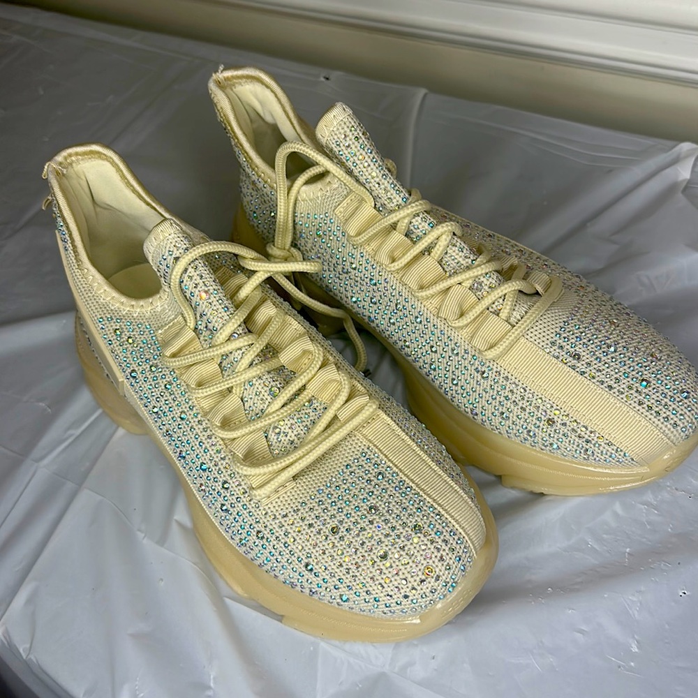 beige sneakers with studs different sizes